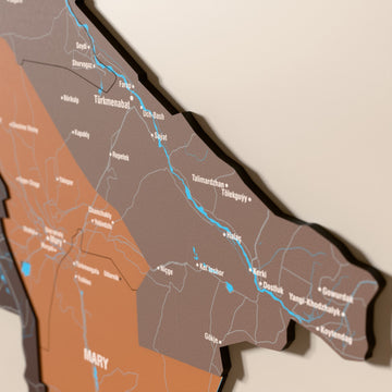 Close-up of the Soil Turkmenistan wooden wall map with layered regions and printed names