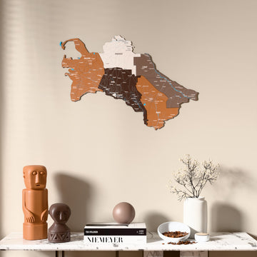 Soil Turkmenistan wooden wall map above a marble console, front view
