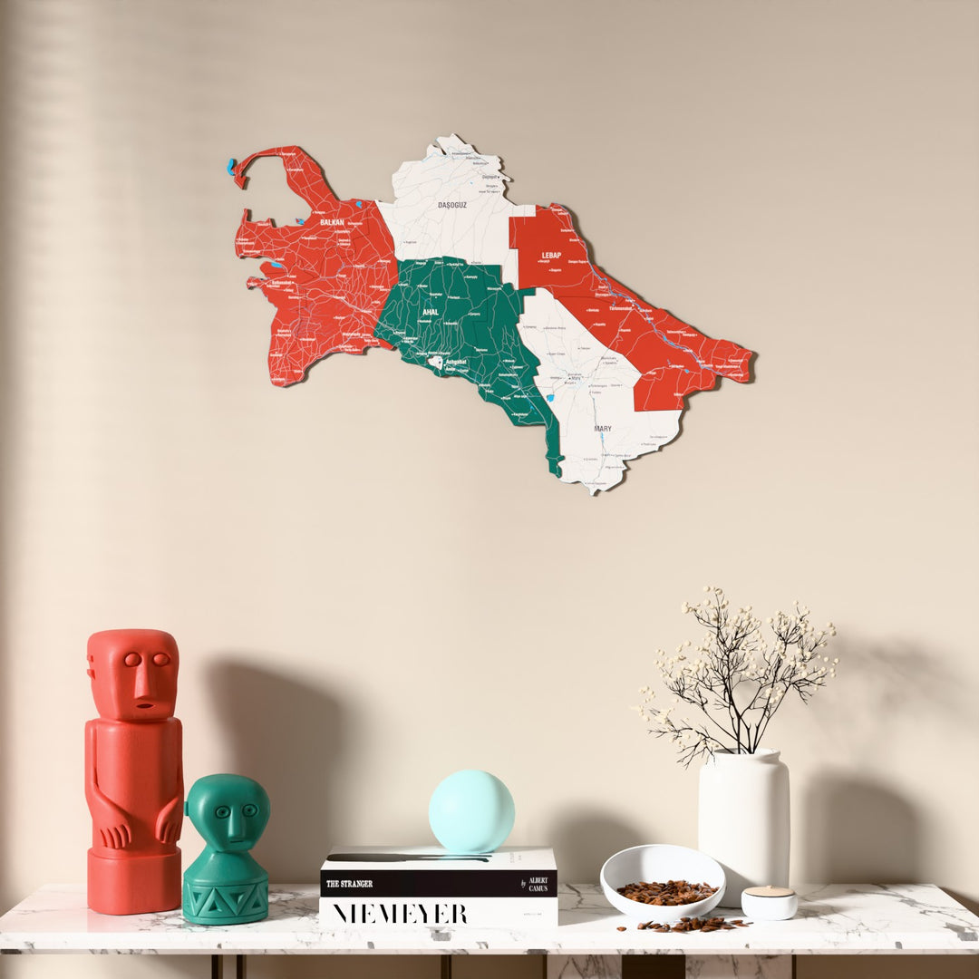 Flag colored Turkmenistan wooden wall map above a marble console, front view
