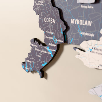 Close-up of the Nimbus Ukraine wooden wall map with layered regions and printed names