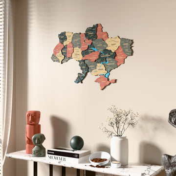 Sage Ukraine wooden wall map beside a sheer curtain, angled view