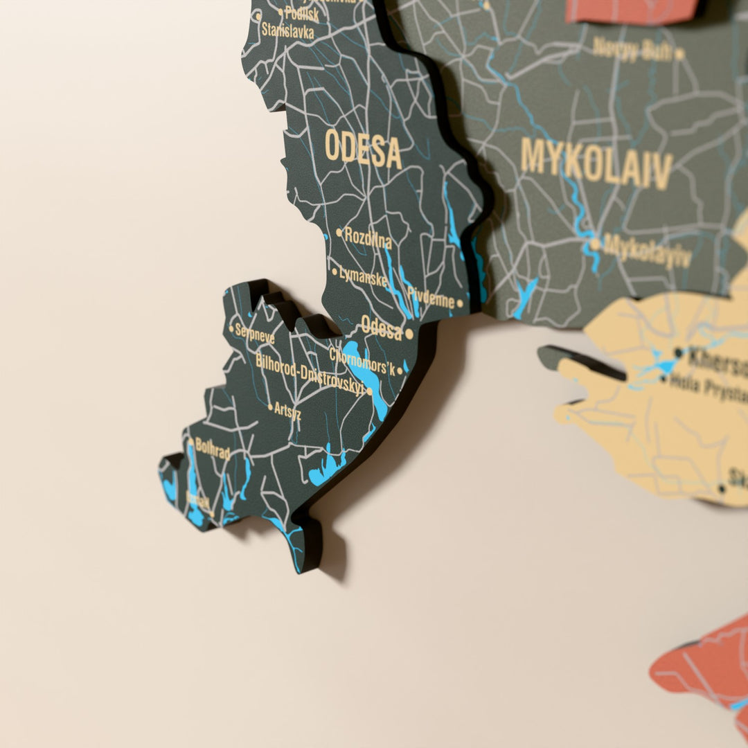 Close-up of the Sage Ukraine wooden wall map with layered regions and printed names
