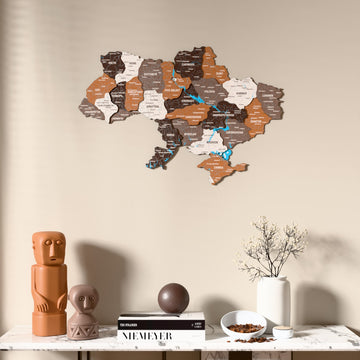 Soil Ukraine wooden wall map above a marble console, front view