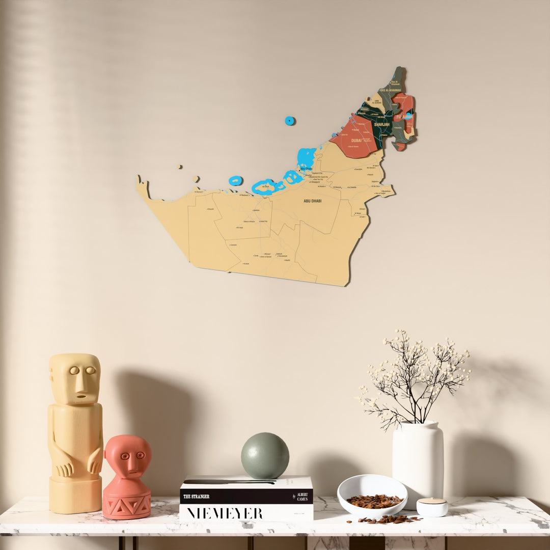 Sage United Arab Emirates wooden wall map above a marble console, front view