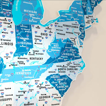 Close-up of the navy metal USA map showing Michigan, Ohio, Indiana, Virginia and the Carolinas in blue tones