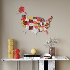 Terracotta United States wooden wall map above a marble console with a yellow figurine and red bust, wide view
