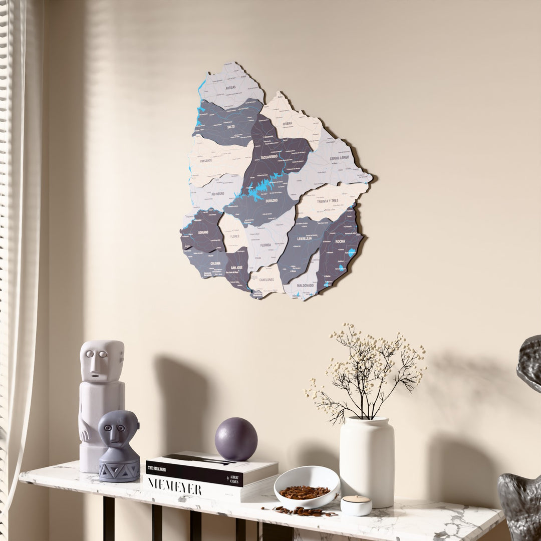 Nimbus Uruguay wooden wall map beside a sheer curtain, angled view