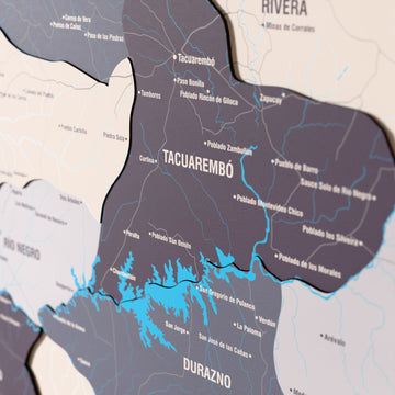Close-up of the Nimbus Uruguay wooden wall map with layered regions and printed names