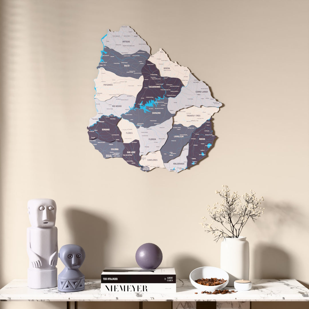Nimbus Uruguay wooden wall map above a marble console, front view