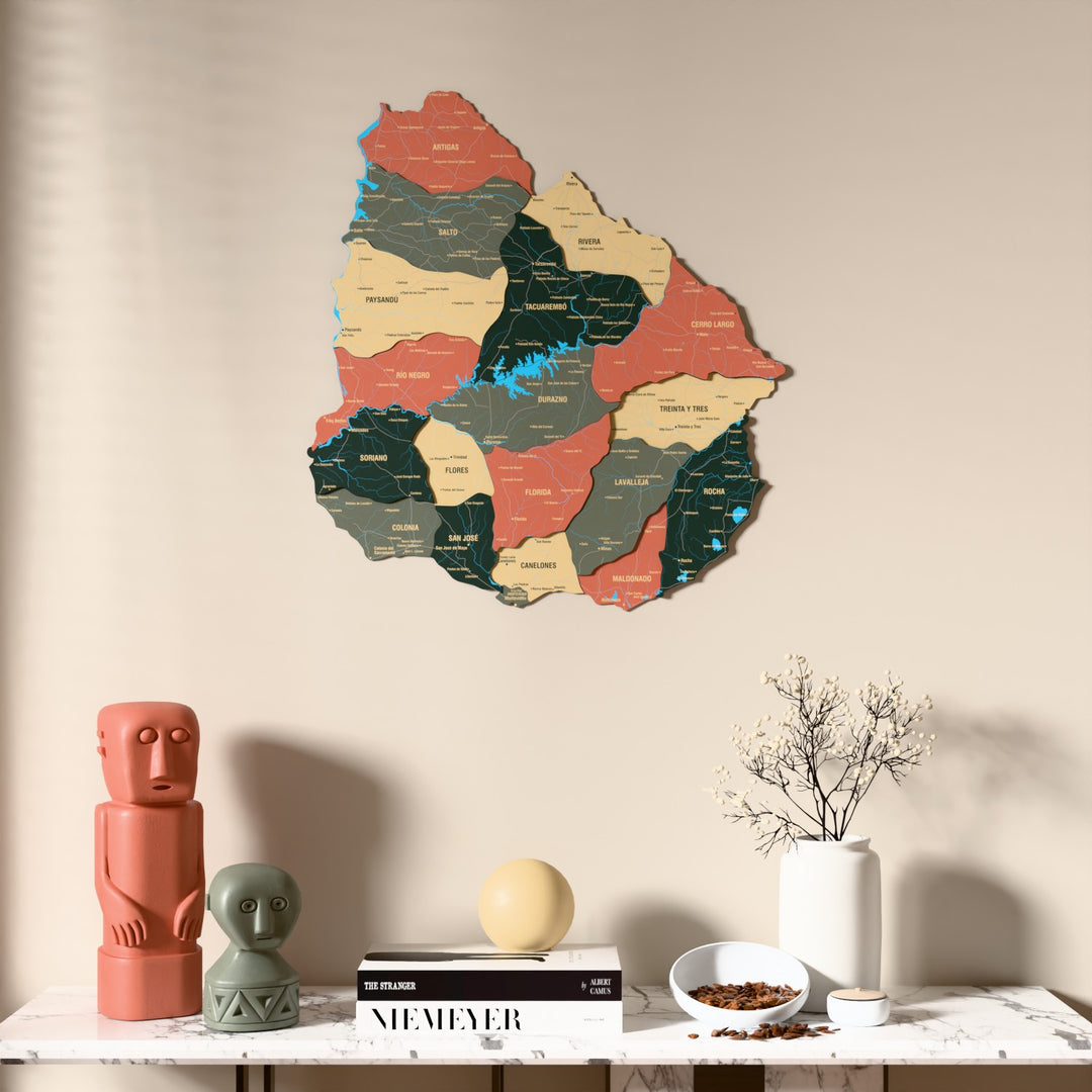 Sage Uruguay wooden wall map above a marble console, front view