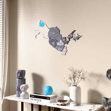 Nimbus Uzbekistan wooden wall map beside a sheer curtain, angled view