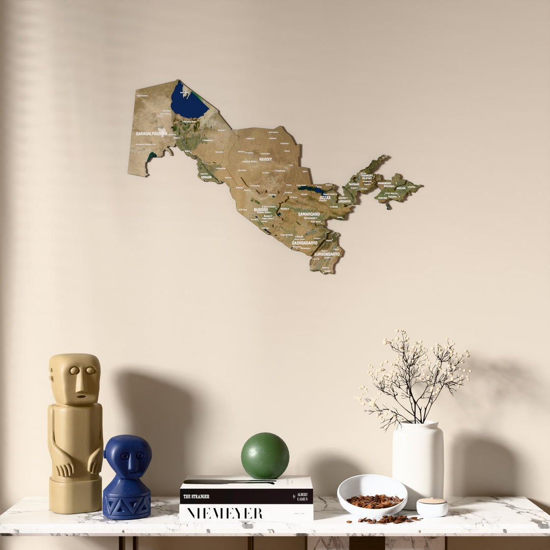 Satellite Uzbekistan wooden wall map above a marble console, front view