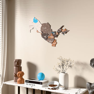 Soil Uzbekistan wooden wall map beside a sheer curtain, angled view