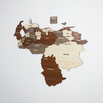 3D wooden Venezuela map with state names in brown, taupe and cream layers, with a small plaque above it