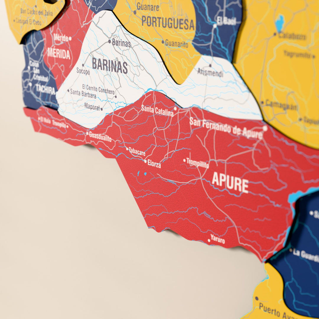 Close-up of the Flag colored Venezuela wooden wall map with layered regions and printed names