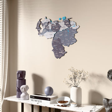 Nimbus Venezuela wooden wall map beside a sheer curtain, angled view