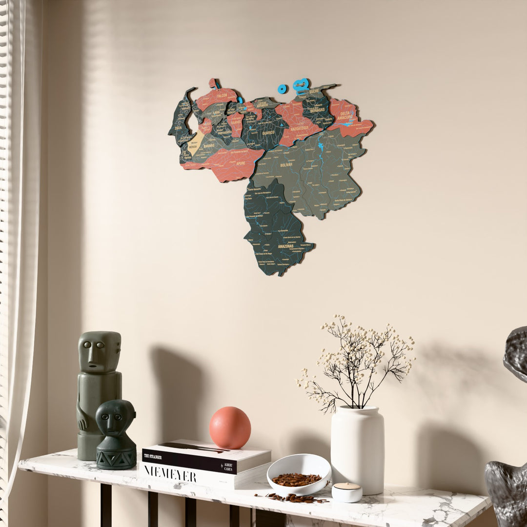 Sage Venezuela wooden wall map beside a sheer curtain, angled view