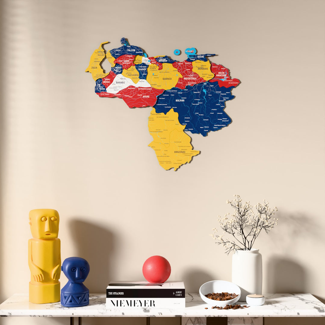 Flag colored Venezuela wooden wall map above a marble console, front view
