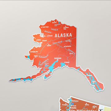 Close-up of the Alaska panel on the terracotta metal USA map with Anchorage and the Yukon River labeled