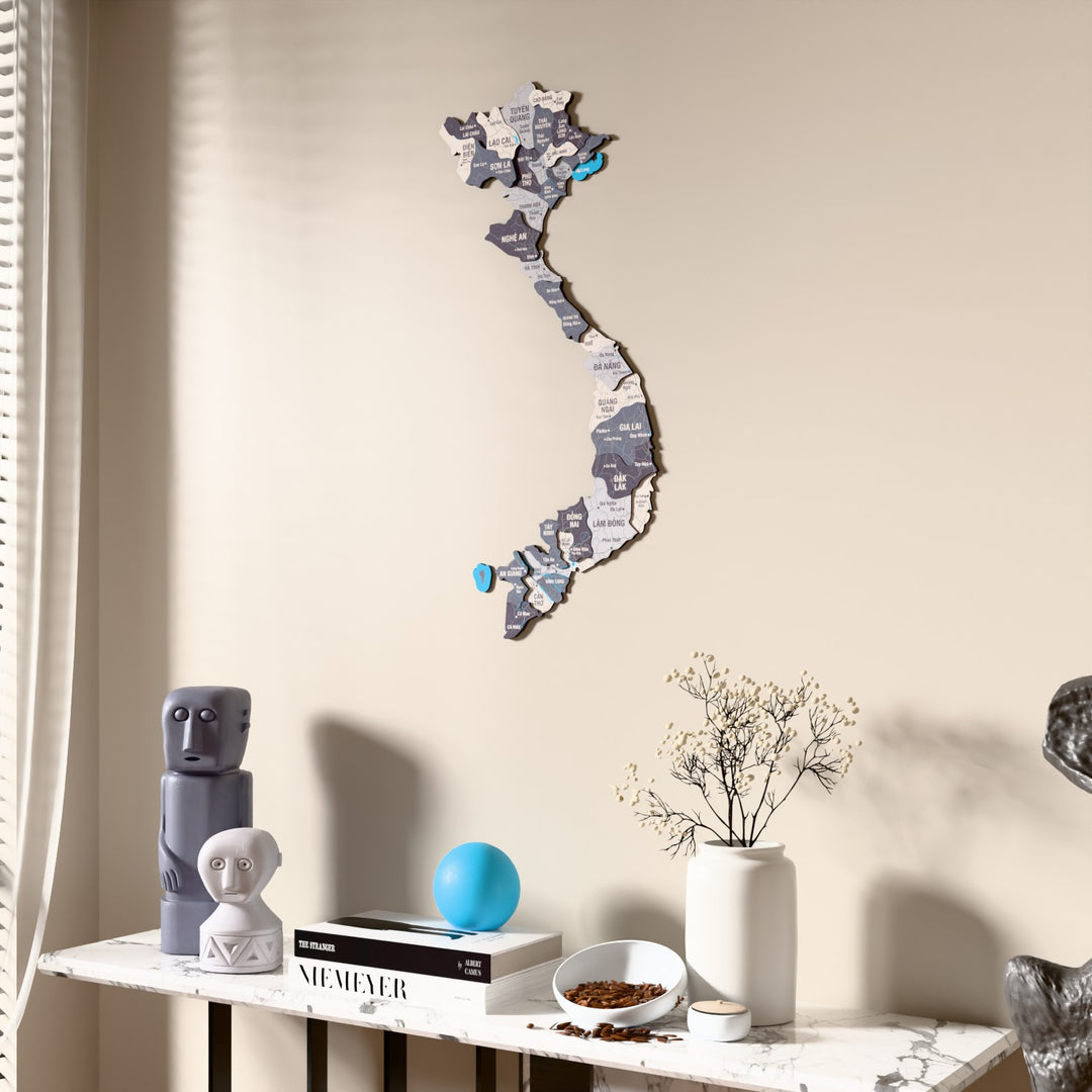 Nimbus Vietnam wooden wall map beside a sheer curtain, angled view