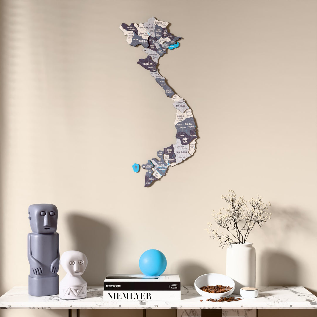 Nimbus Vietnam wooden wall map above a marble console, front view