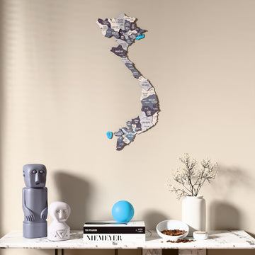 Nimbus Vietnam wooden wall map above a marble console, front view