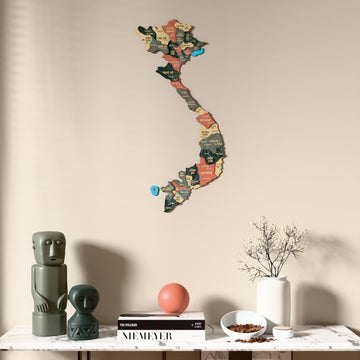 Sage Vietnam wooden wall map above a marble console, front view