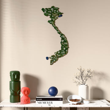 Satellite Vietnam wooden wall map above a marble console, front view