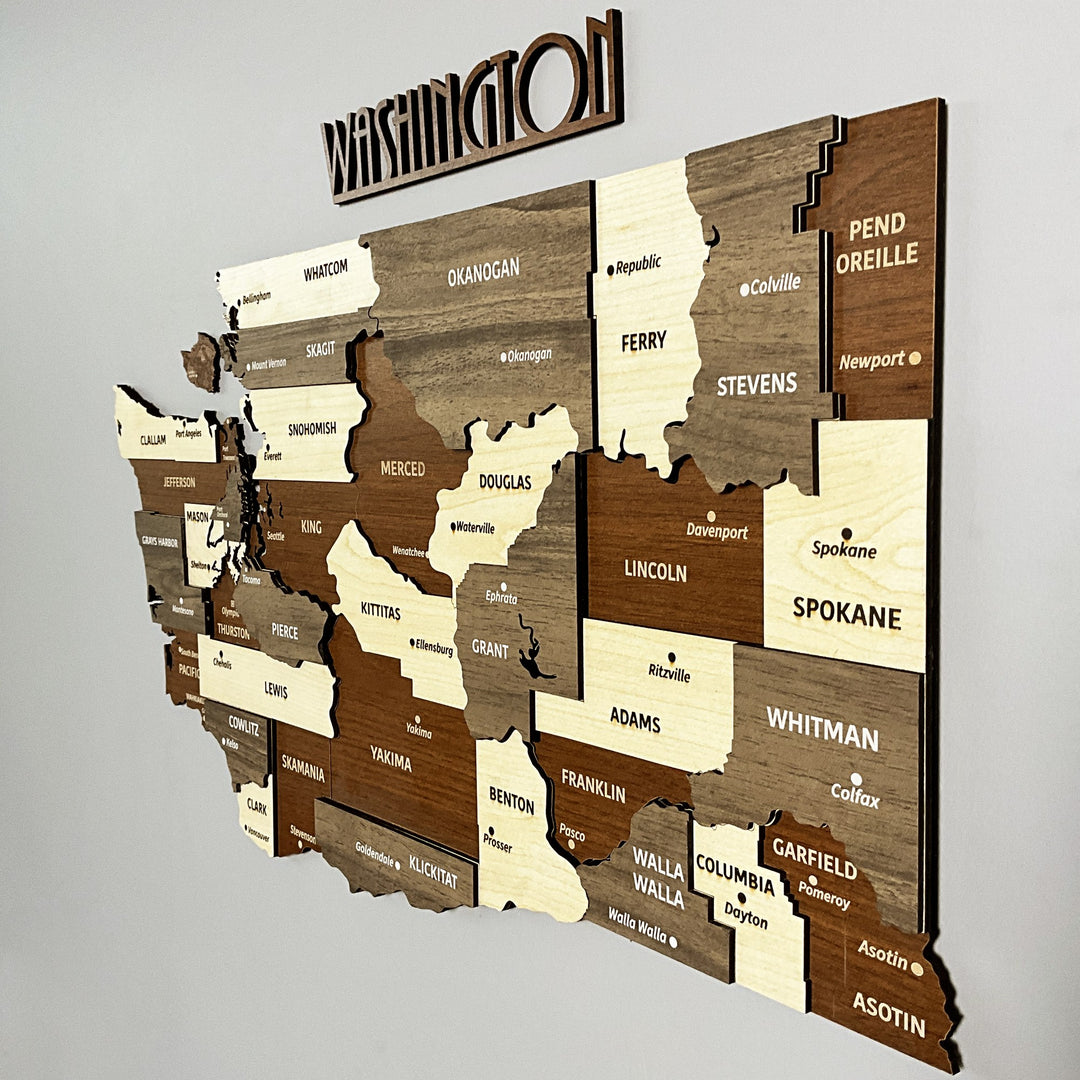 Close-up of the Washington State wooden map showing Spokane, Whitman, Okanogan and Yakima counties in layers