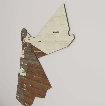 Side-angled view of the Jordan wooden wall map showing the layered depth of its cream and brown wood regions