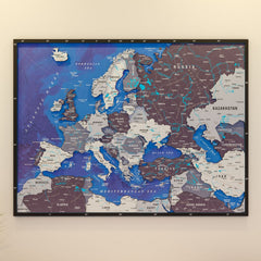 Nimbus wooden Europe map with rivers in a dark frame, blue seas and gray and plum countries, front view