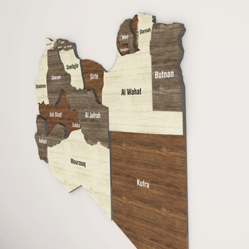 Libya wooden wall map seen from a low side angle, showing layered depth from Sirte to Kufra