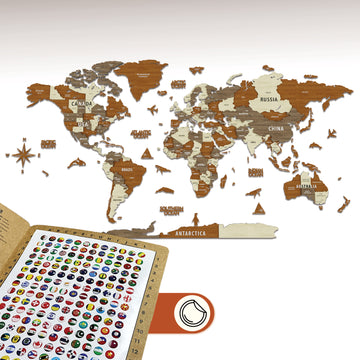 Close-up of the multicolor wooden world map with a flag push pin card at lower left
