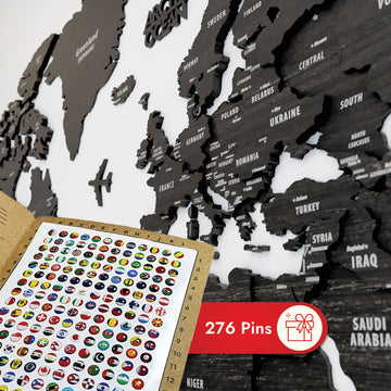 Close-up of Europe on the Tuana wooden world map with a card of 276 flag pins