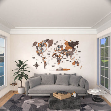 Soil wooden world map in a bright living room with windows and a gray sofa, wide shot
