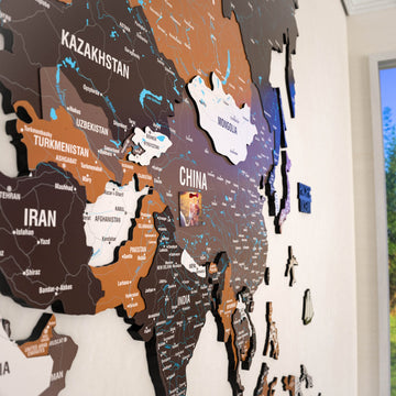 Close-up of Central Asia and China on the layered Soil wooden world map