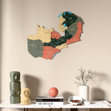 Sage Zambia wooden wall map above a marble console, front view