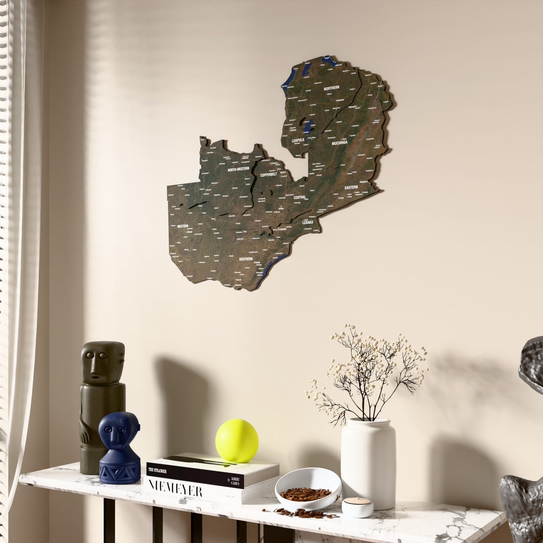 Satellite Zambia wooden wall map beside a sheer curtain, angled view