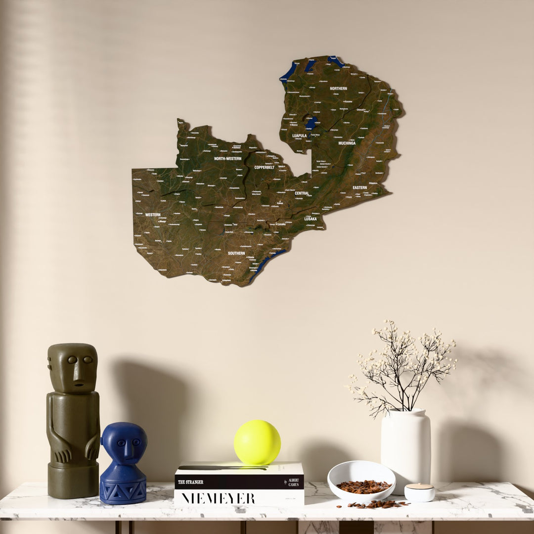 Satellite Zambia wooden wall map above a marble console, front view