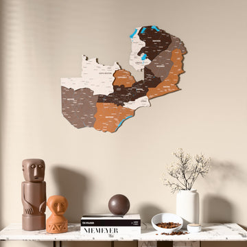 Soil Zambia wooden wall map above a marble console, front view