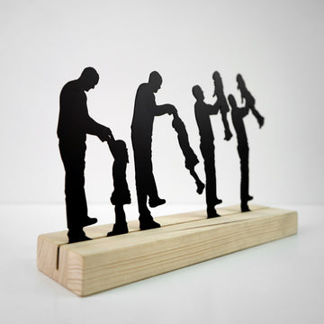 metal-table-decors-metal-table-accessories-the-father-and-the-daughter-modern-metal-table-decor-for-office-spaces-colorfullworlds