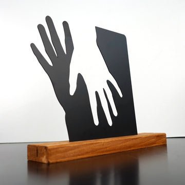 couple-crossing-hands-silver-metal-decor-for-home-colorfullworlds