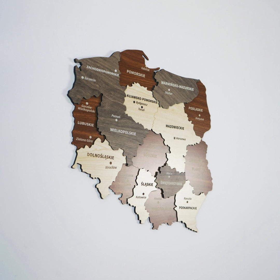 Poland wooden wall map in layered brown, gray and beige wood, slightly angled view on a light wall