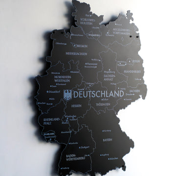 Large black metal Germany map from a steep angle showing Bavaria, Baden-Wurttemberg and Berlin labels