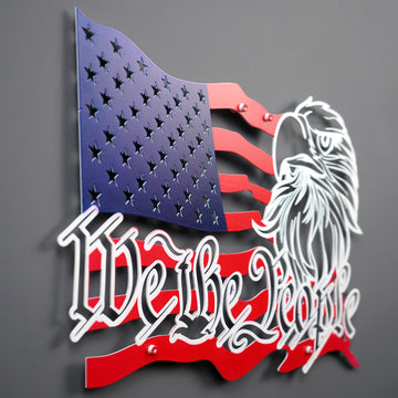 Large view of the flag colored We The People metal wall art showing the star field and lettering