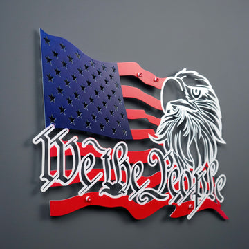 We The People US flag metal wall art with an eagle head, in flag colors on a gray wall, front view